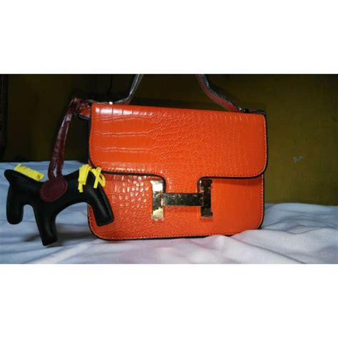 selempang hermes tas